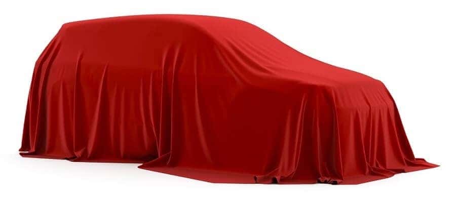 New 2022 Mazda under a red sheet