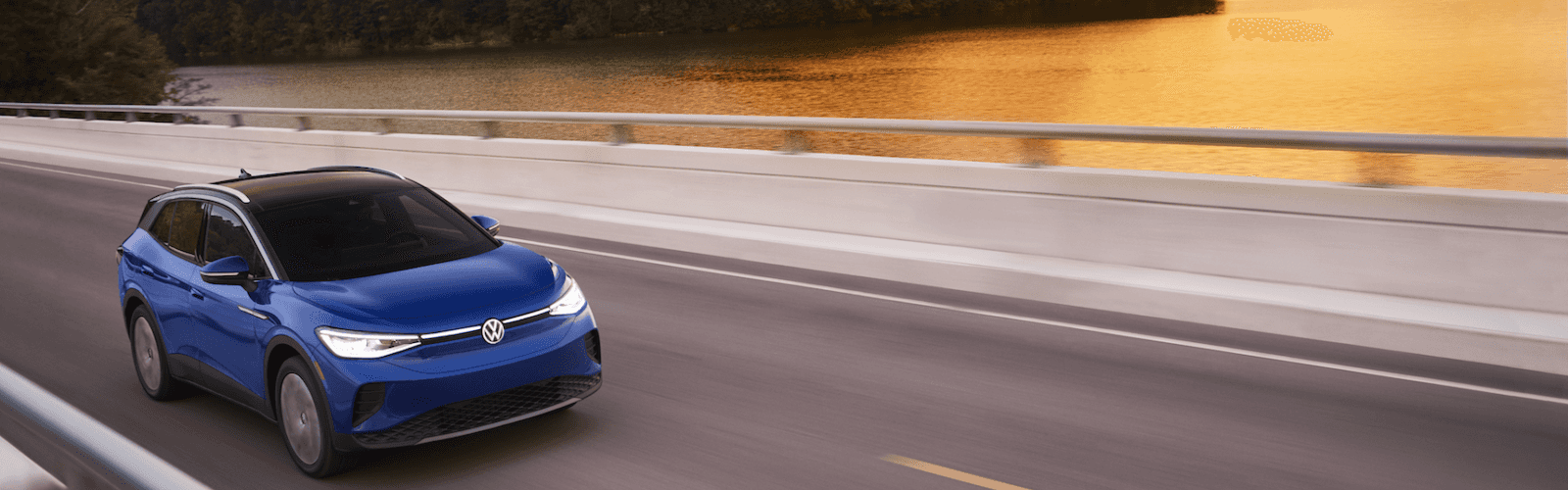 blue atlas driving over bridge