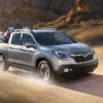 2019 Honda Ridgeline with motorcycles banner