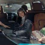 cargo area of 2019 toyota 4Runner being loaded with surfboard