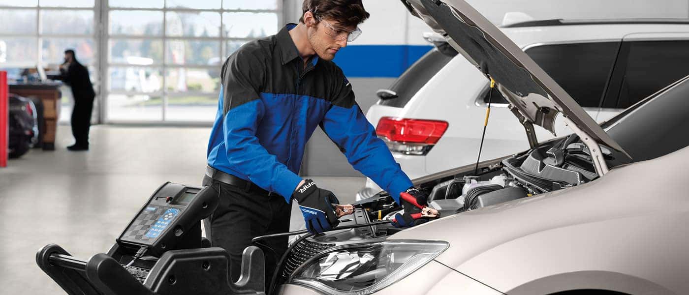Service department member testing battery