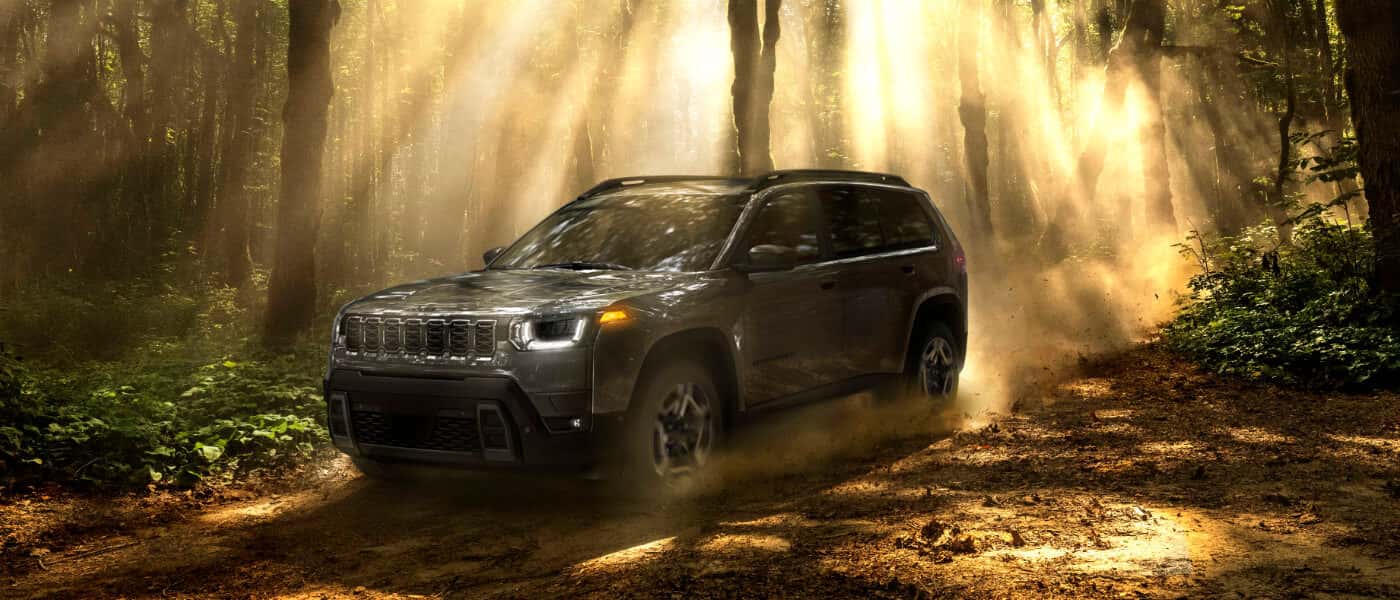2026 Jeep Cherokee Exterior On Shadowed Forest Trail