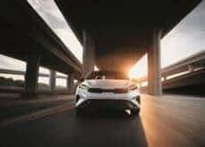 Kia Forte with Sun Behind It