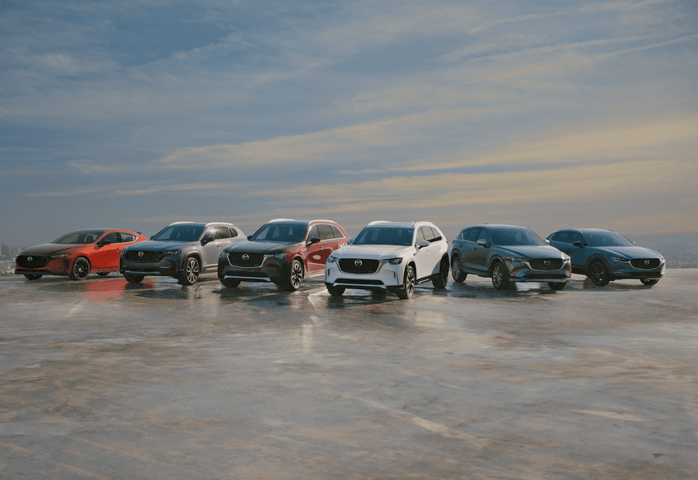 2025 Mazda MX-30, CX-3, CX-30, CX-4, Mazda3, Miata, and CX-5 all parked parallel to each other
