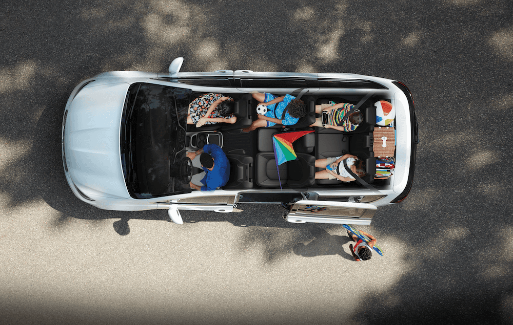 Bird's eye view of a family car looking at the interior of a family minivan