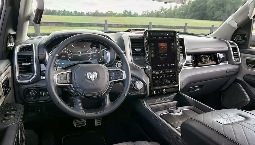 2025 RAM 1500 interior with horizontal center screen and passenger touchscreen