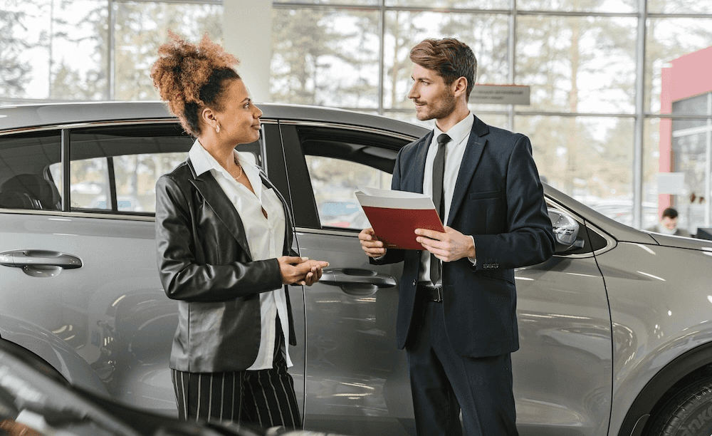 Sales Advocate helping a customer find a reliable used car in Richmond, VA