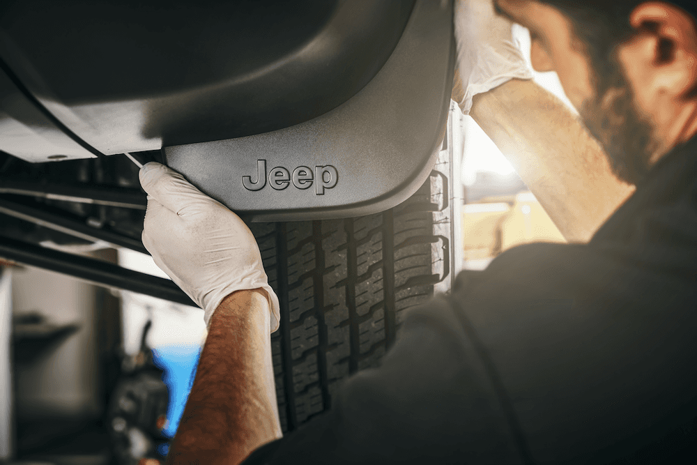 Genuine OEM Jeep part being installed on a Jeep Compass Trailhawk