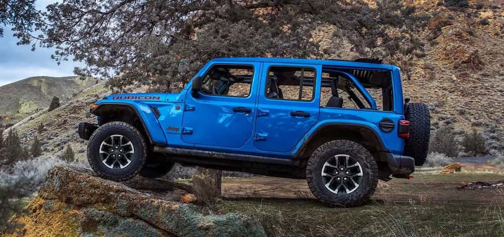 Blue 2026 Jeep Wrangler off road driving