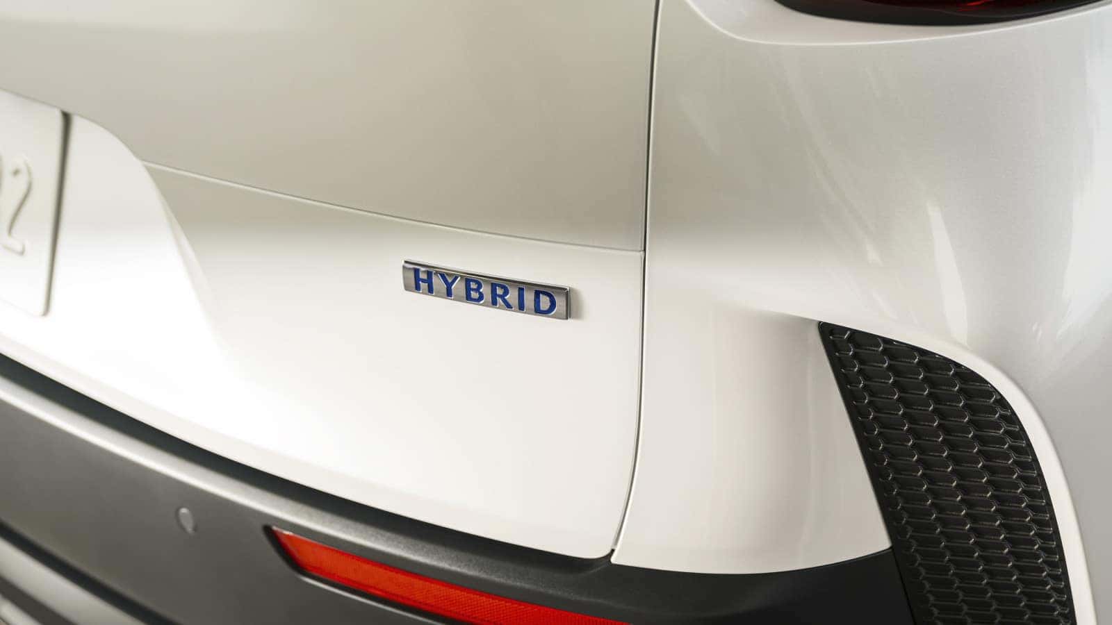 2026 Mazda CX-50 Hybrid with hybrid badge on exterior. Mazda hybrid SUV