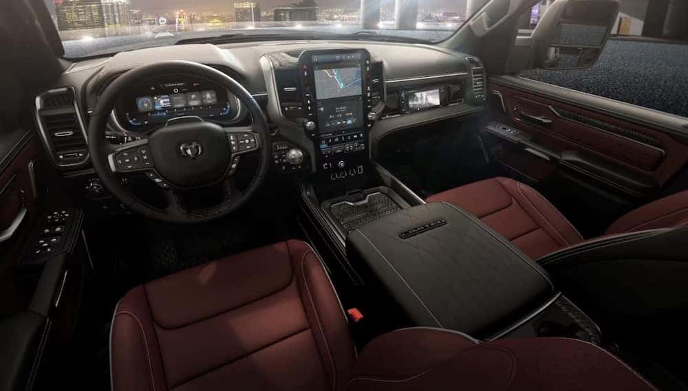 2026 RAM 1500 interior with large center touchscreen and the class-exclusive 10.25-inch front passenger screen