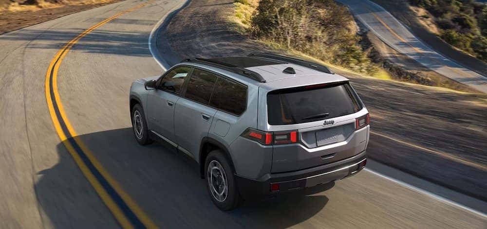 2026 Jeep Cherokee driving on a highway