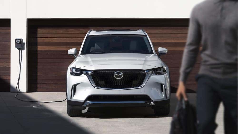 2024 Mazda CX-90 PHEV plugged in to charge
